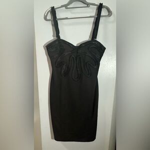 kardashian kollection black lace dress Who made Kim Kardashian's black lace dress, black pumps, and jewelry?